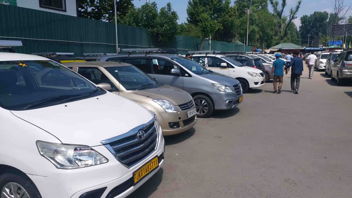 Vehicles parked in a Kashmir area.